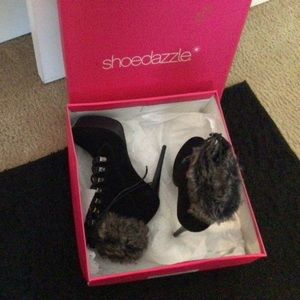 Brand new 5 inch heels black with fur from Shoe Dazzle nice for the winter